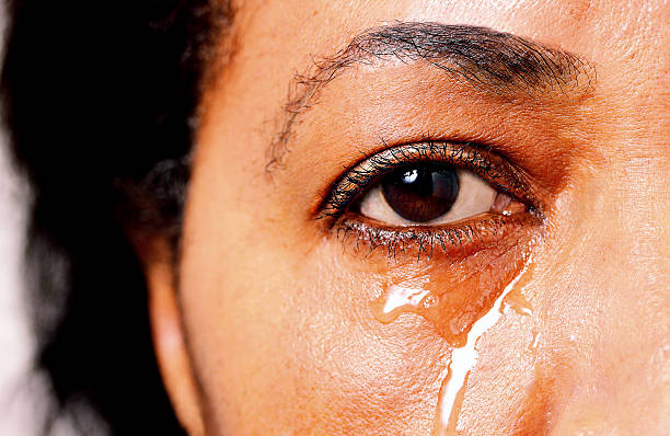 A close-up of a mother's eye with a tear — the day everything changed